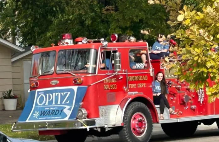 Moorhead City Council candidate Sarah Opitz’s use of fire truck during parade goes to a hearing — West Fargo Government news